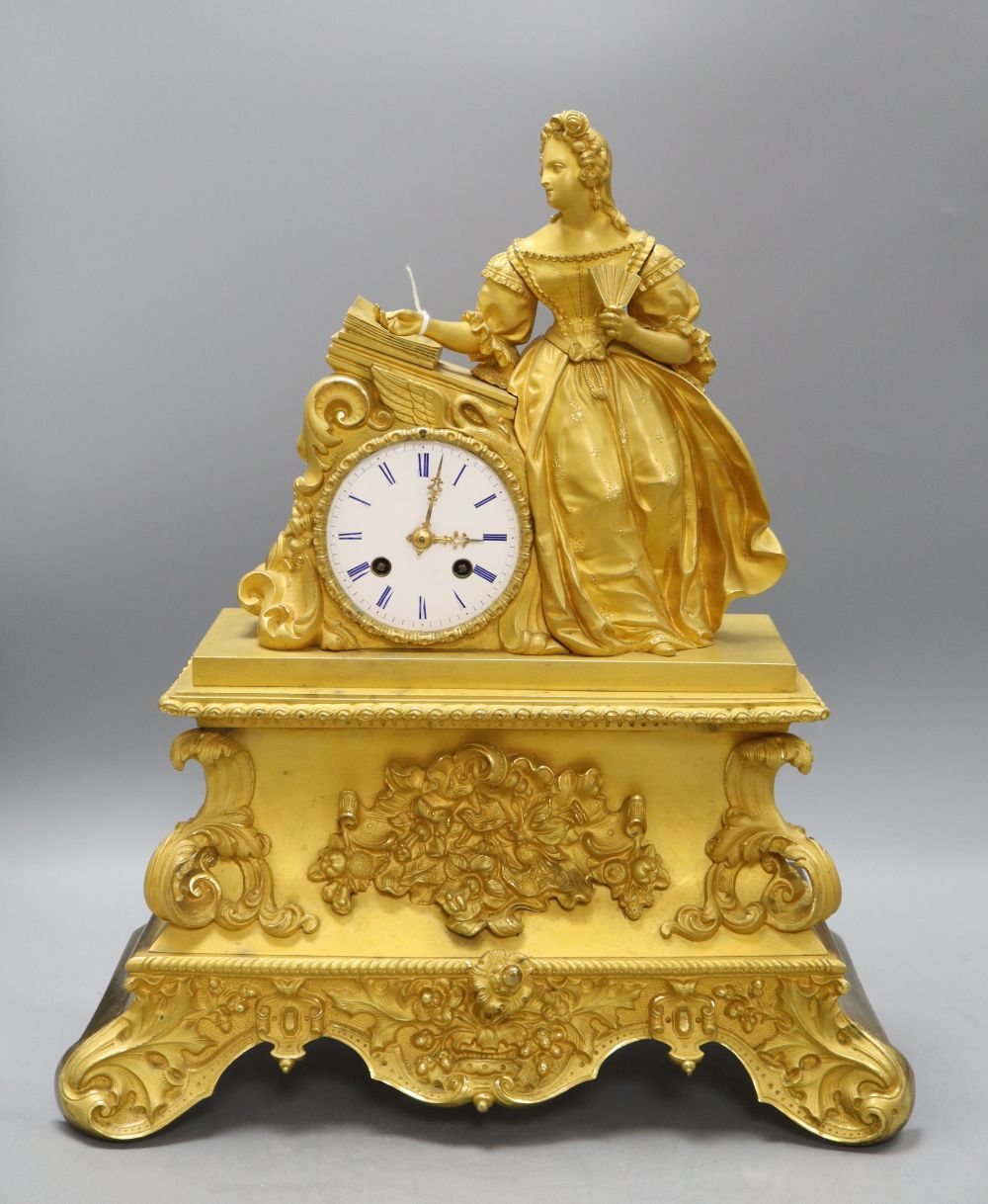 A French ormolu clock with a surmount of Madam Sevigne, height 45cm
